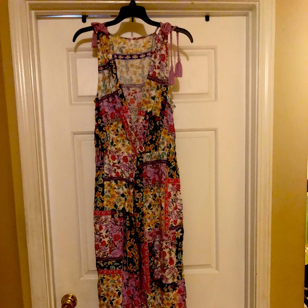 Multi colored jumpsuit... Medium in size.